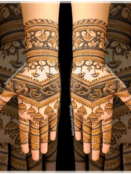 A beautiful design featuring jhumka and diya motifs. This is a perfect design for festivals like Diwali or for a wedding celebration.