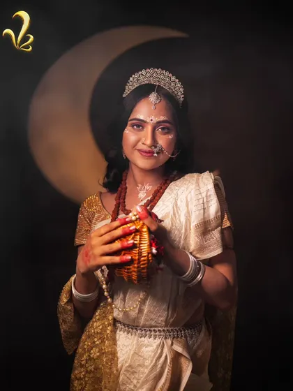 This image of Brahmacharini shows her holding a kamandalu, a symbol of asceticism and self-sufficiency. The styling choices reflect a woman who is building the foundation of her own life.