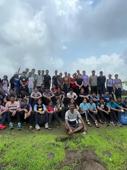 The team at the summit of the Karnala Fort trek. This shared experience of overcoming a physical challenge together strengthens the bonds between my athletes and coaches.