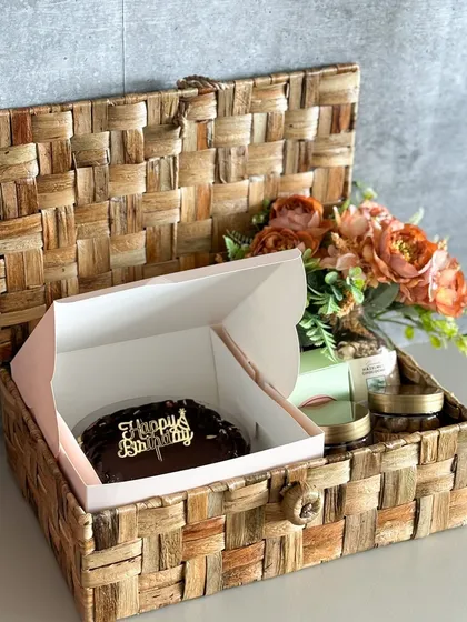 Make a birthday wish extra special with our Amara Trunk Hamper. It includes a delicious, rich chocolate birthday cake alongside a curated selection of our other popular treats, all packed in a beautiful keepsake wicker trunk.