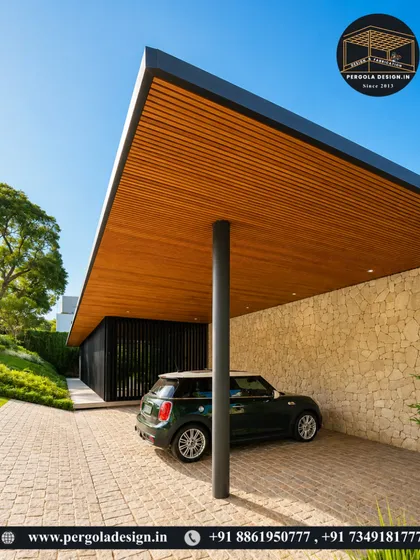 We designed this modern carport to feel both open and protective. The cantilevered roof with its rich wood-panelled ceiling is supported by a single, sleek pillar, creating an unobstructed, minimalist look that perfectly complements the home's architecture while providing excellent vehicle protection.
