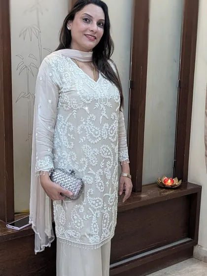 Seeing my customers happy is the best part of my job. Here is a lovely client looking absolutely gorgeous in one of our exclusive handwork party wear sets. Her smile says it all and it makes all the hard work worth it.