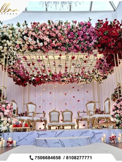 A magnificent floral mandap or stage in a stunning gradient of pastel colors. The sheer volume of flowers creates an incredibly luxurious and romantic setting.