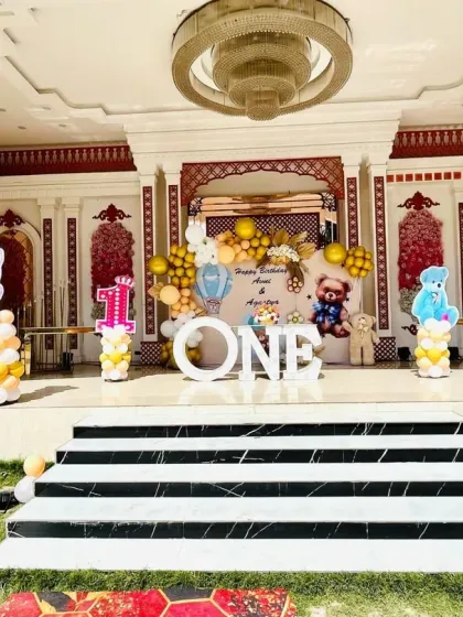 A wide shot of the impressive teddy bear themed stage setup in a large venue.
