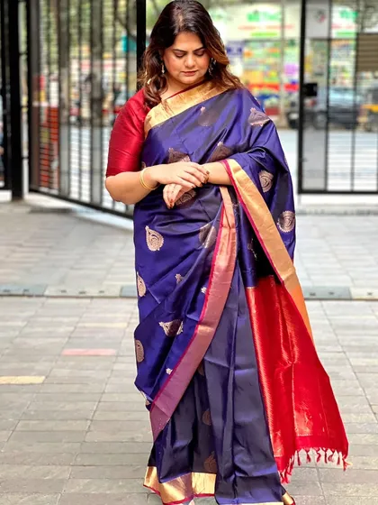 A full view of the client's beautiful silk saree, showing how the simple hairstyle complements the rich fabric.