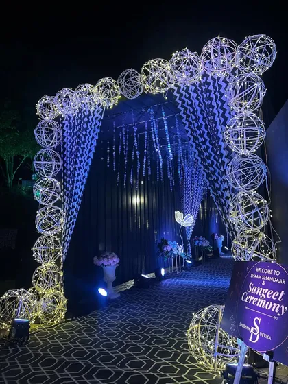 The welcome sign and entrance decor for the Sangeet, setting a glamorous tone for the night.