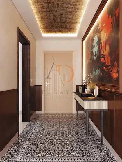 A bold and artistic entryway featuring a large, dramatic painting of Lord Shiva, patterned floor tiles, and a sleek console table.