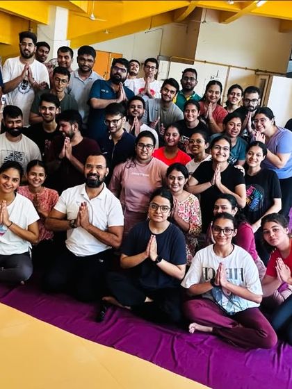 A selfie with a group of MBA students after our yoga workshop. It's rewarding to see the next generation of professionals embracing wellness.