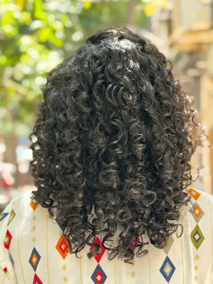 More examples of my short curly haircuts, from bobs to layered chops, each one personalized to the client's curl pattern and face shape.