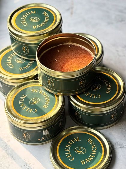 A collection of our Tiramisu tins, ready to be shared. These are perfect for parties, corporate gifts, or a simple self-care treat.