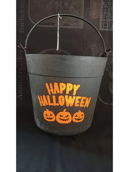 A black Halloween bucket with a 'Happy Halloween' message and pumpkin design that lights up. It's a modern and spooky twist on the traditional trick-or-treat pail.