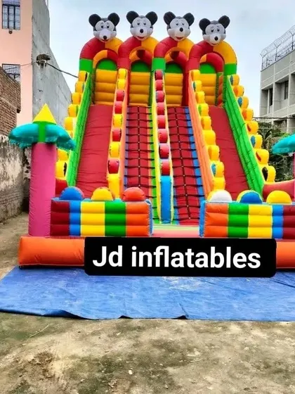 This 4-slider bouncy with Mickey Mouse heads is a popular design for amusement parks and resorts.