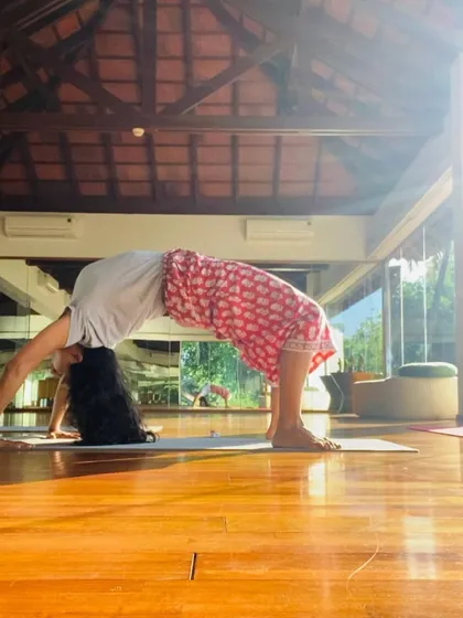 A moment of release in a backbend. Yoga helps to free the mind and find your core, which are both essential for a dancer.