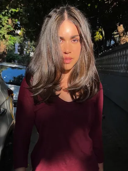 A front view of these glossy, healthy locks. The subtle highlights frame the face beautifully and add dimension without being overwhelming.