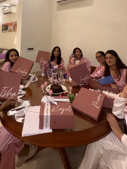 Nothing makes me happier than seeing a bride tribe this thrilled. I created these personalized dusty rose boxes for a bridal shower, each with the bridesmaid's name, making the moment they were asked to be part of the wedding extra special.