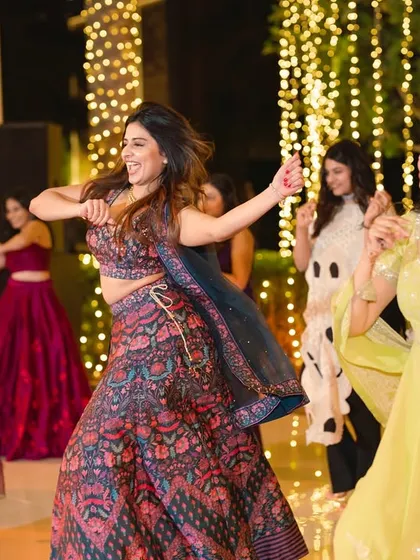 The joy of a group performance, with everyone smiling and in sync.