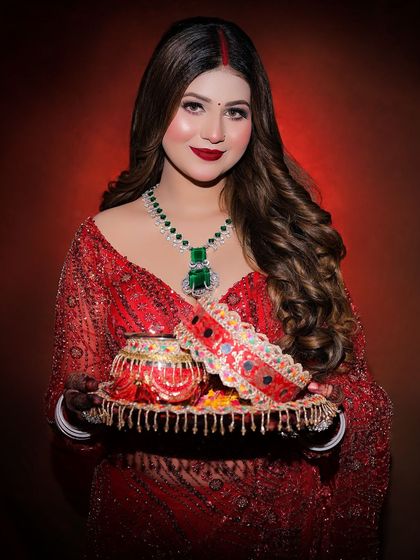 Another portrait of the model with her thali, showcasing her complete festive look.