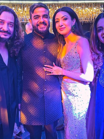 A happy moment with the newly-weds and my collaborator Nidhi Prabhu. It's always a joy to be a part of such special celebrations.