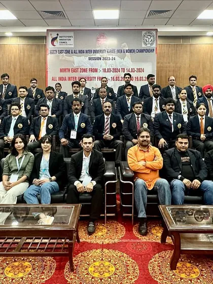 A series of photos showing the dedicated group of officials, judges, and technical committee members from the North East Zone & All India University Karate Championship. It takes a large, coordinated team to run a successful national-level event.