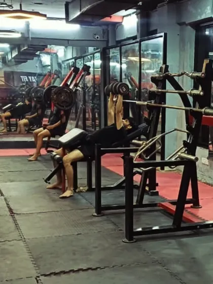 The strength and conditioning corner of our gym. We have everything needed for building functional strength, from free weights and barbells to incline benches and squat racks.