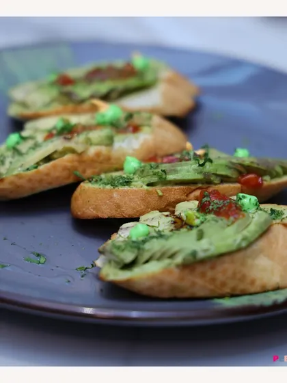 Our Avocado Salsa Bruschetta is a fresh and healthy option. We top crispy toasted bread with creamy sliced avocado and a zesty salsa, creating a light yet flavorful appetizer or snack.