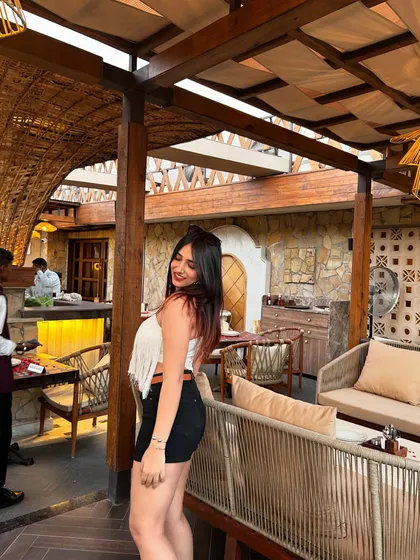 A happy, smiling shot of me at Tahia. This shows me enjoying the ambiance, which makes the content feel more authentic.