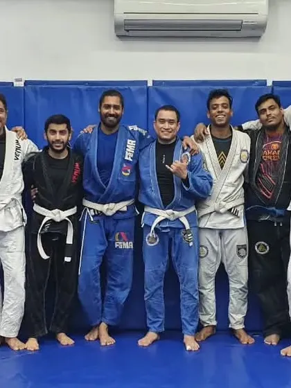 A lineup of dedicated martial artists after a class. The bonds formed through shared effort on the mats are what make our community a true family.