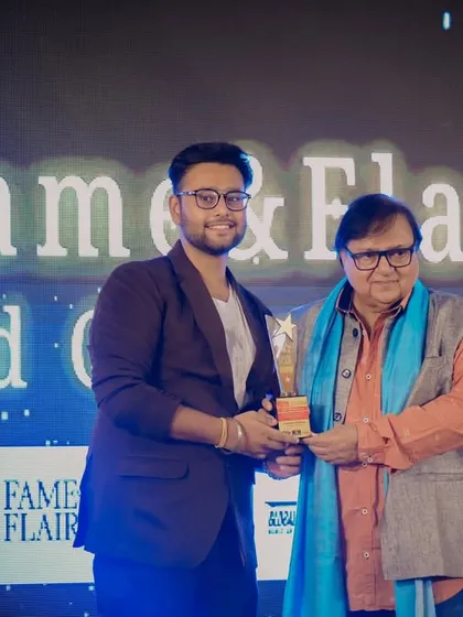 A student receives an award from Mr. Rakesh Bedi at the ceremony. Our programs provide opportunities for students to be recognized for their hard work in a real industry setting.
