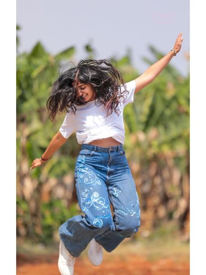 Another happy jump in my cosmic jeans. The freedom of movement and expression is what wearable art is all about.