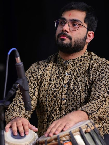 This portrait captures the essence of performance, where I am fully immersed in the music.