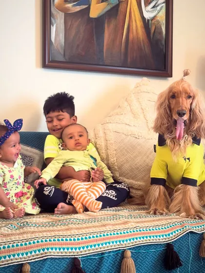 The full cousin crew. Posto posing patiently with all the little ones in the family. He's the most responsible big brother.
