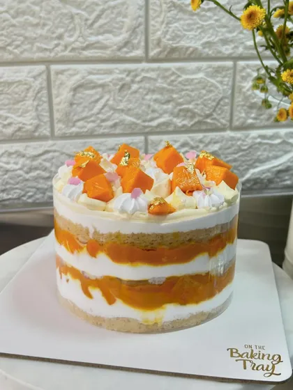 When it's mango season, my kitchen is all about fresh Alphonso mangoes. This Mango Tango cake has layers of soft vanilla sponge, fresh mango pulp, and light chantilly cream, topped with juicy mango chunks. It’s pure sunshine in every bite.