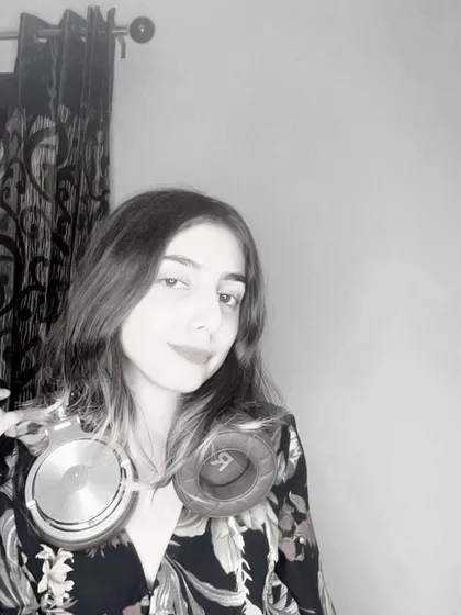 A simple black and white portrait with my headphones. Ready to drop some fire tracks for the night.