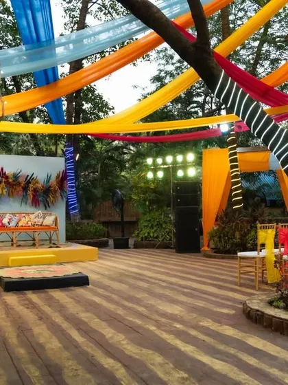 The main stage and dance floor area for the carnival event, set against a backdrop of colorful drapes and professional lighting to get the party started.