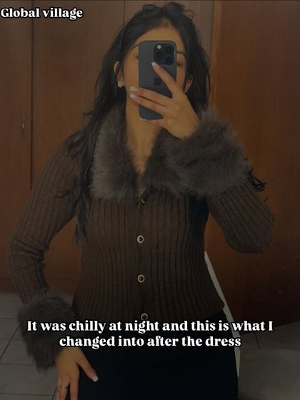 It got chilly at the Global Village at night, so I changed into this cozy cardigan with fur details. Layering is key when packing for a trip with varying temperatures.