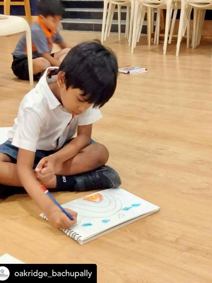 The concentration on this little one's face is just priceless. Art is such a wonderful way for children to focus and express their imagination.