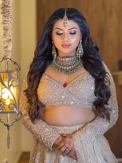 An eyes-closed shot to highlight the dramatic, blended eyeshadow and the flawless application of the makeup.