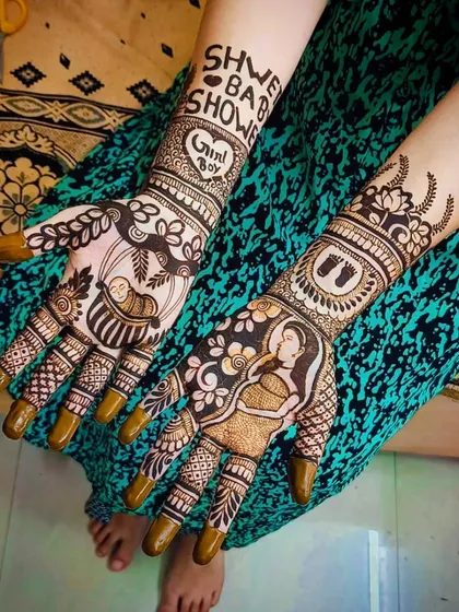This photo captures the full design, from the fingertips to the custom text on the forearms.
