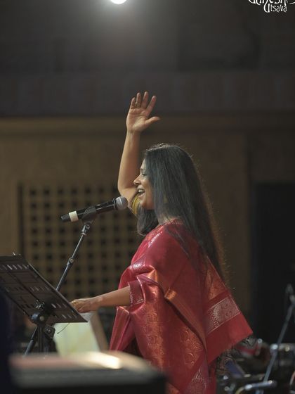 Waving to the audience at the Bengaluru Ganesh Utsava. The connection with the listeners is the most rewarding part of any performance.