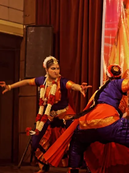 A dynamic shot of my students performing a piece with intense energy. Their costumes and expressions are perfectly suited for this powerful portrayal.