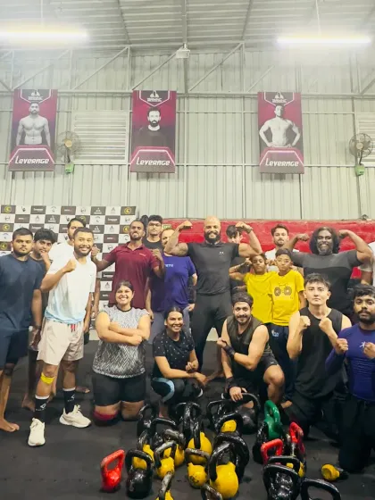 This is what our community looks like after a tough workout. We are a group of individuals from all walks of life who show up, put in the work, and support each other. This is our fit family.