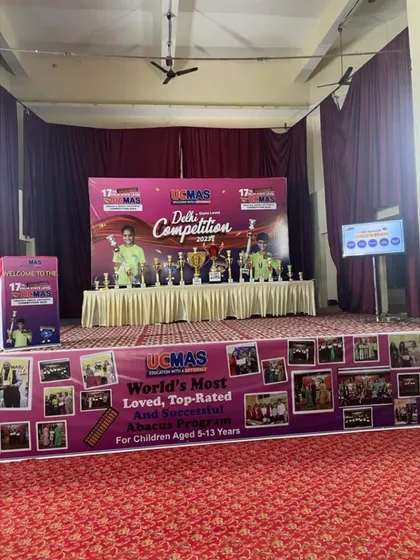 The stage is ready for the 17th Delhi State Level Competition. The banners and trophies create an exciting atmosphere for our young competitors to demonstrate their mental math prowess.