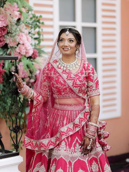 Different angles of my beautiful bride Hetvi, showcasing her traditional and elegant wedding look that perfectly complements her vibrant pink lehenga.