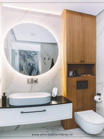 A modern bathroom should be a sleek and functional sanctuary. This design showcases our skill in combining materials like marble and wood with smart features like a backlit mirror and floating vanity to create a spa-like experience at home.
