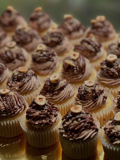 A beautiful batch of our Nutella cupcakes with a vanilla base. The combination of light vanilla cake and rich Nutella frosting is a classic.