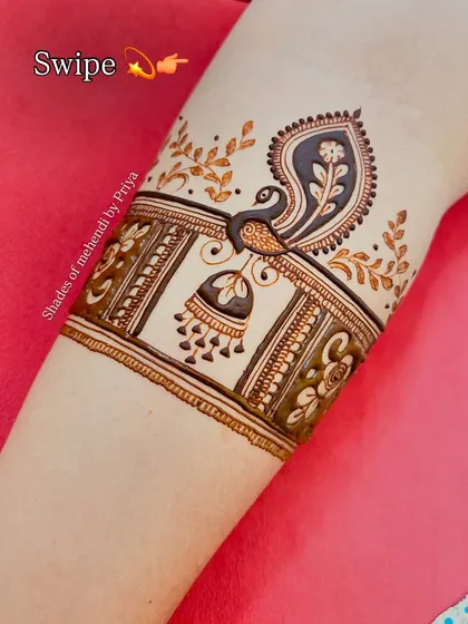 Another view of the Gudi Padwa special design, showing the clean lines and bold shapes of the peacock.