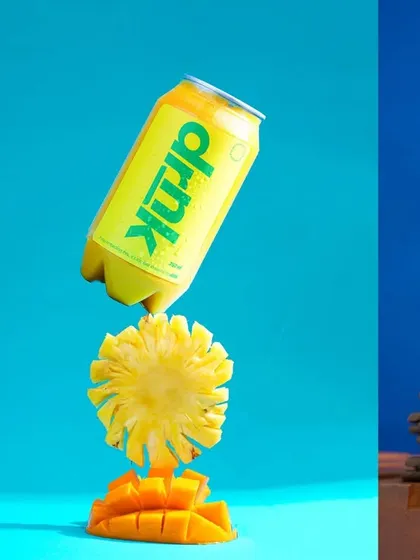 This triptych showcases the versatility of creative beverage photography. It features a dynamic levitating shot of a pineapple drink, a close-up of a mango drink, and a fully styled cookies and cream milkshake.