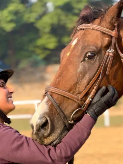 The happy smile on this rider's face says it all. The joy of connecting with these magnificent animals is a truly special feeling.