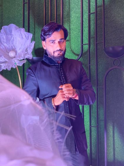 Another moment from the 90th birthday event. The floral decor and elegant setting provided a beautiful backdrop for the art performance.