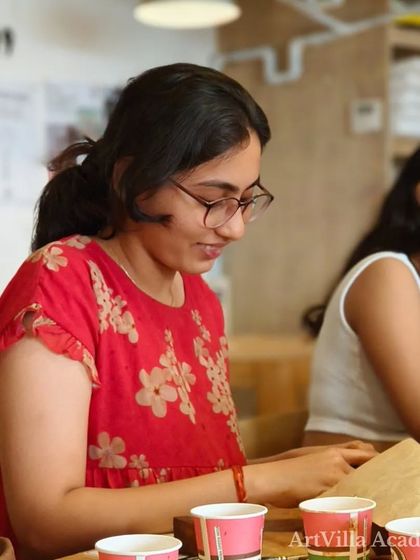 The tables at Doolally Taproom are filled with students engrossed in their pottery projects. It's a wonderful fusion of craft, food, and community.